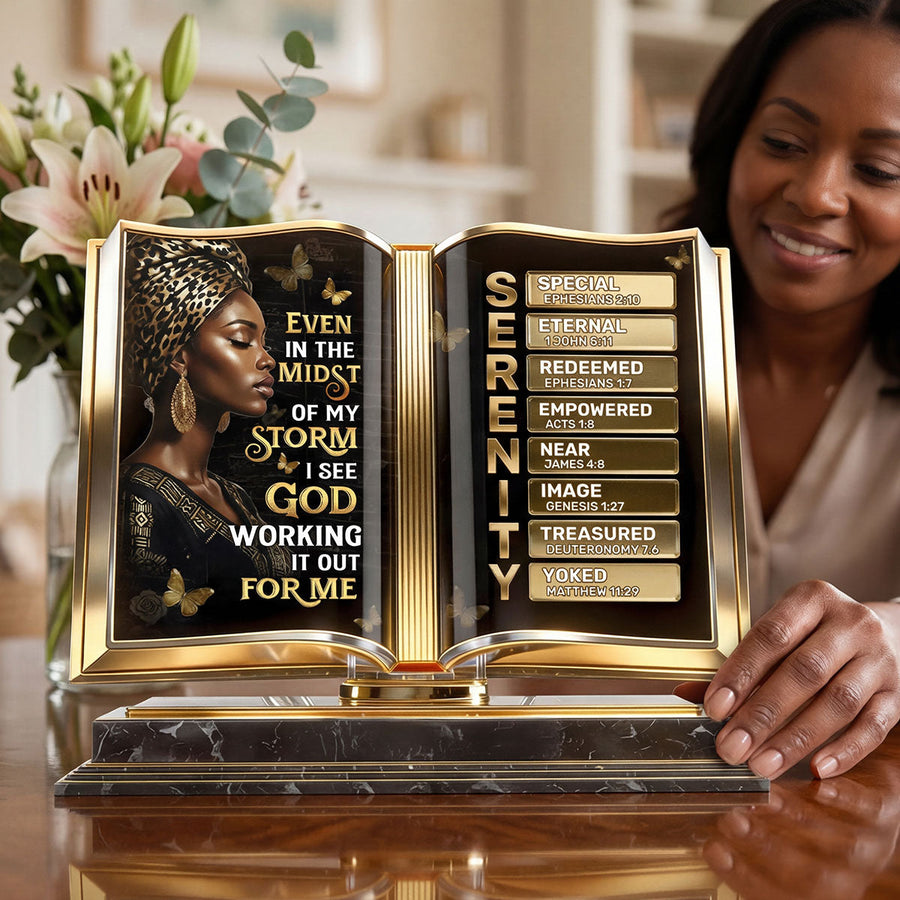 Hands holding the personalized plaque in front of a bookshelf