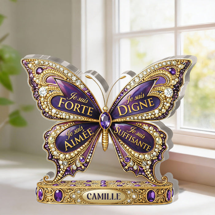 She Is Confident plaque displayed beside fresh flowers
