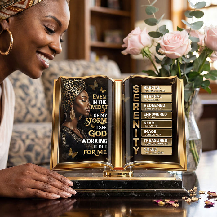 Woman smiling while holding her personalized plaque