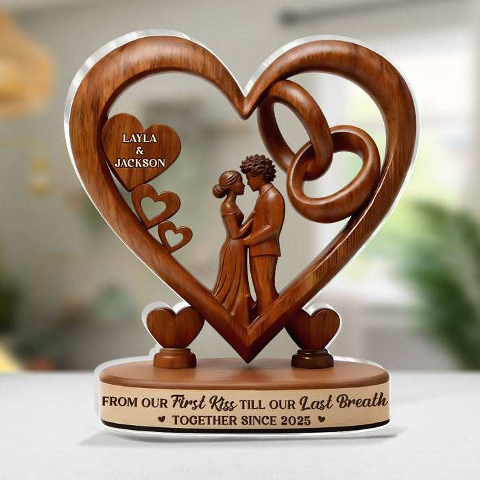 Woman smiling while holding her personalized plaque