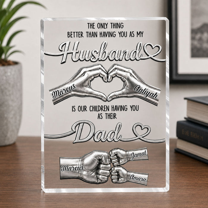 Woman smiling while holding her personalized plaque