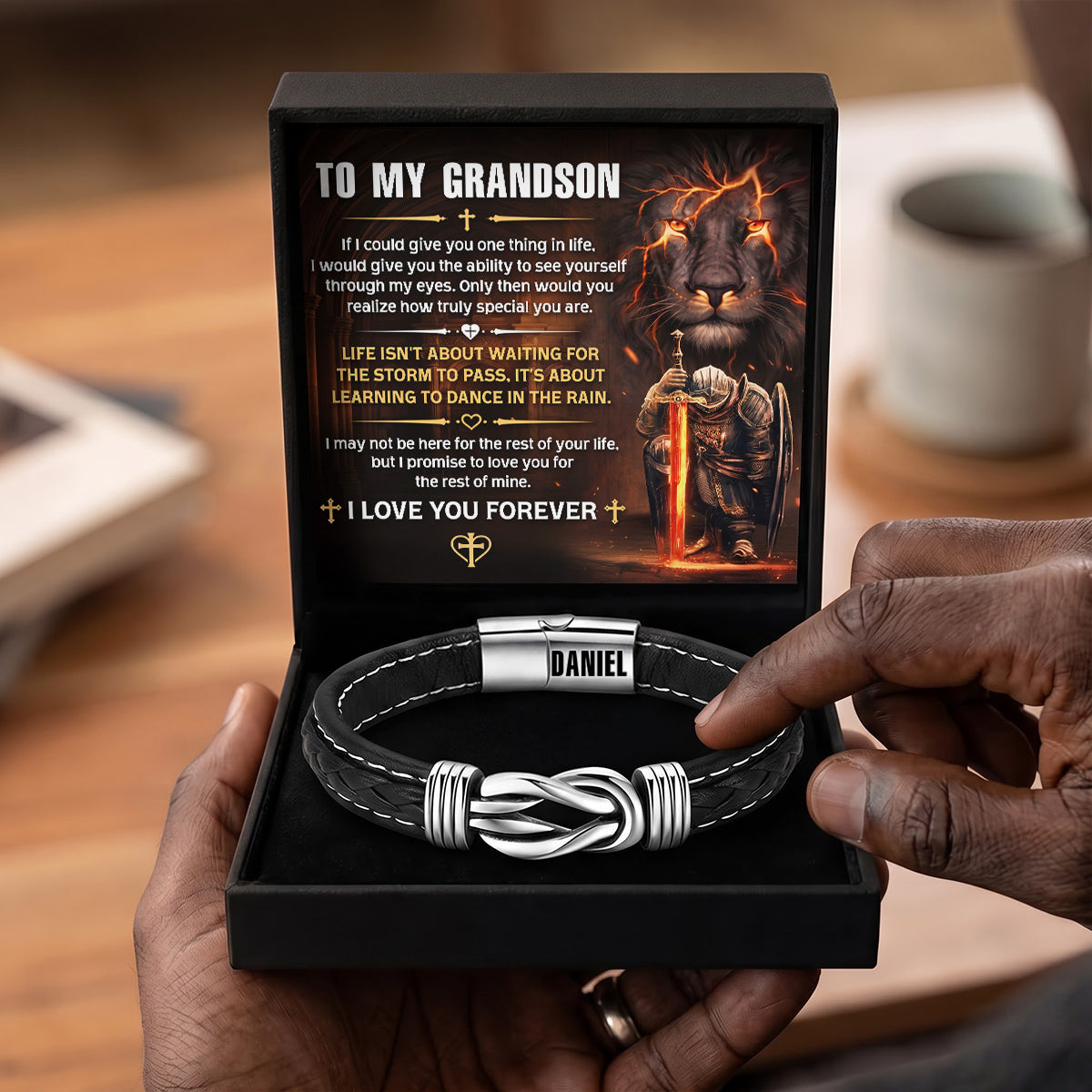 To My Grandson Life Isn't About Waiting For The Storm To Pass - Personalized Braided Leather Infinity Bracelet