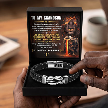 To My Grandson Life Isn't About Waiting For The Storm To Pass - Personalized Braided Leather Infinity Bracelet