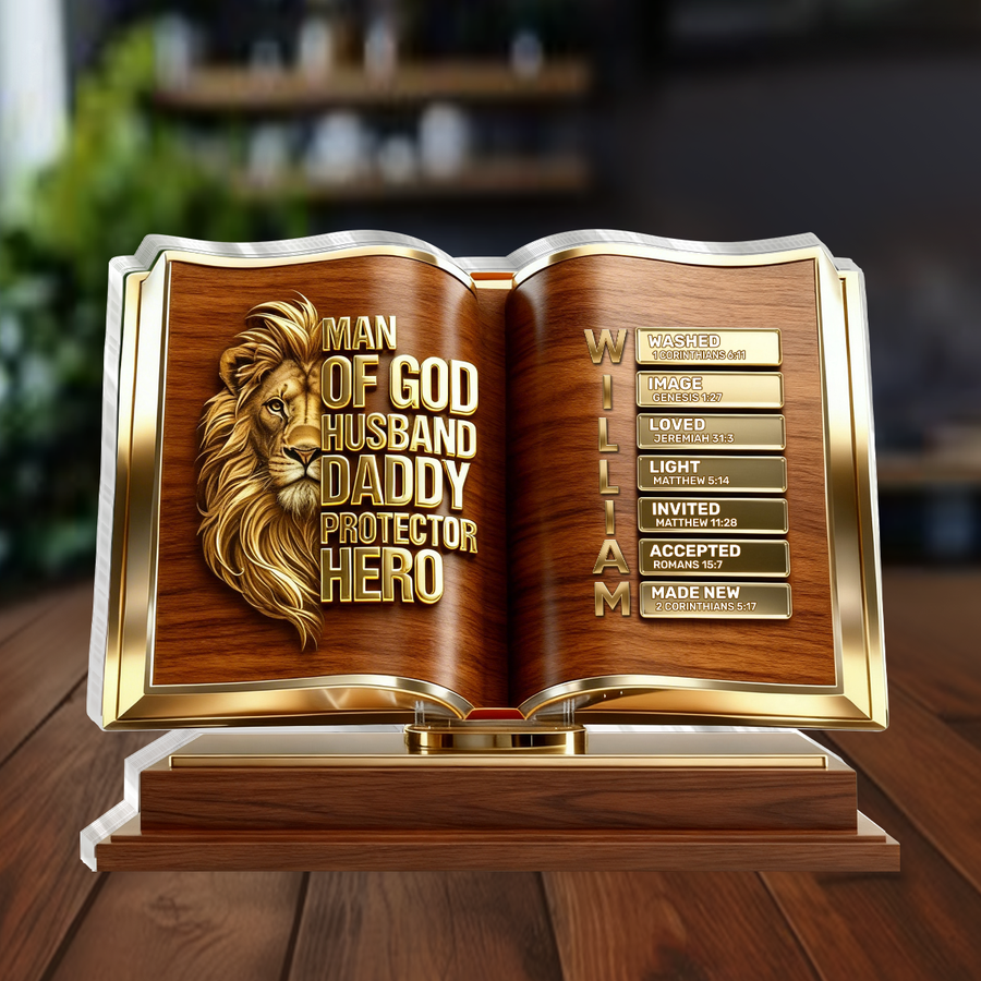 Hands holding the personalized plaque in front of a bookshelf