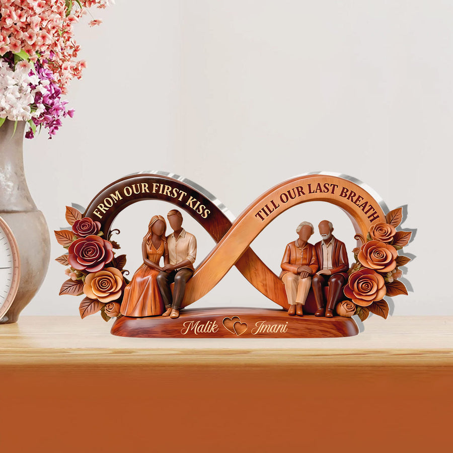 Hands holding the personalized plaque in front of a bookshelf