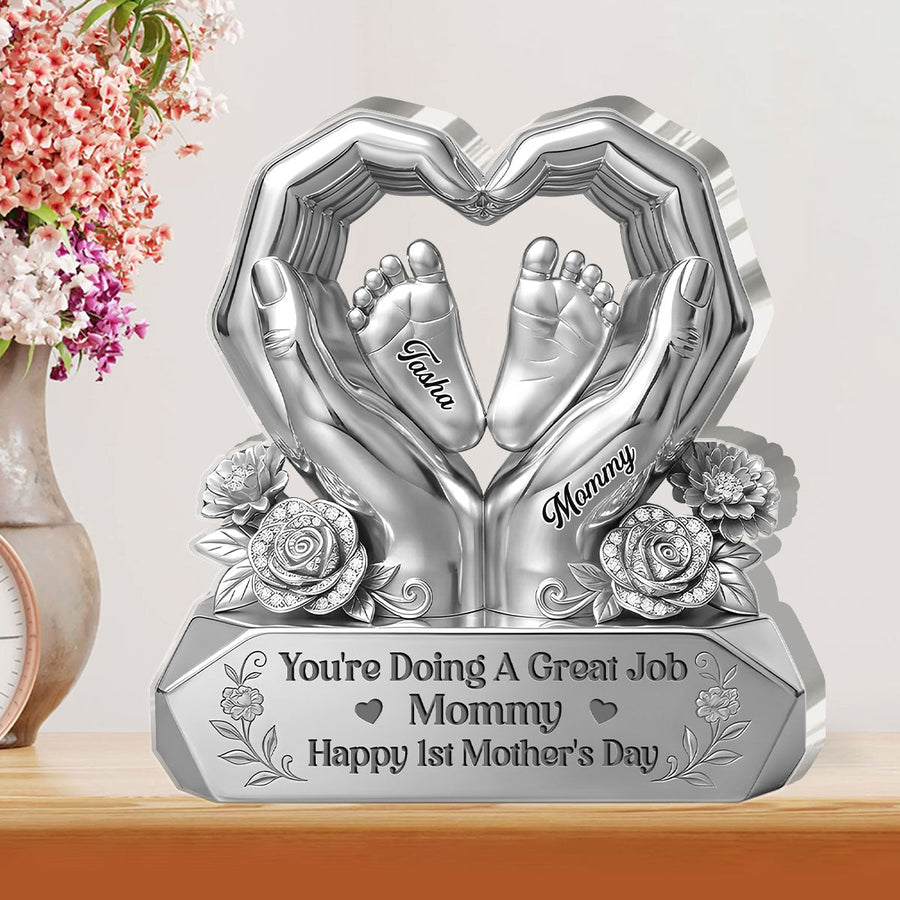 Hands holding the personalized plaque in front of a bookshelf