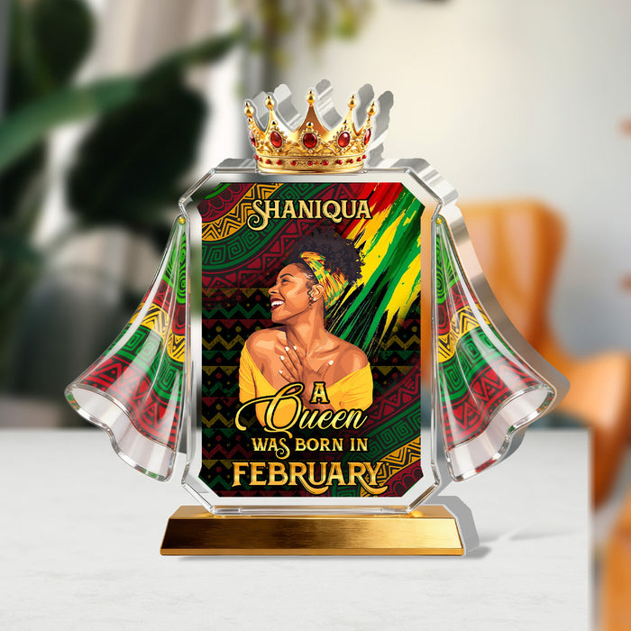 She Is Confident plaque displayed beside fresh flowers