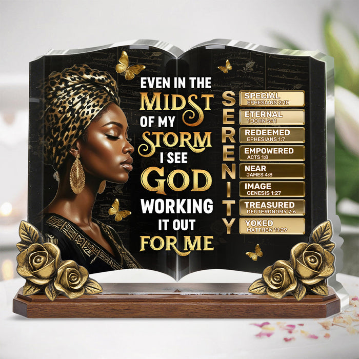 Woman smiling while holding her personalized plaque