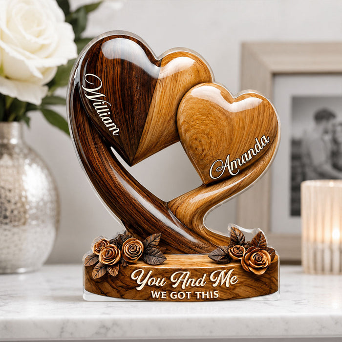 Woman smiling while holding her personalized plaque