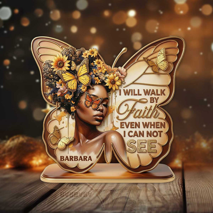Woman smiling while holding her personalized plaque